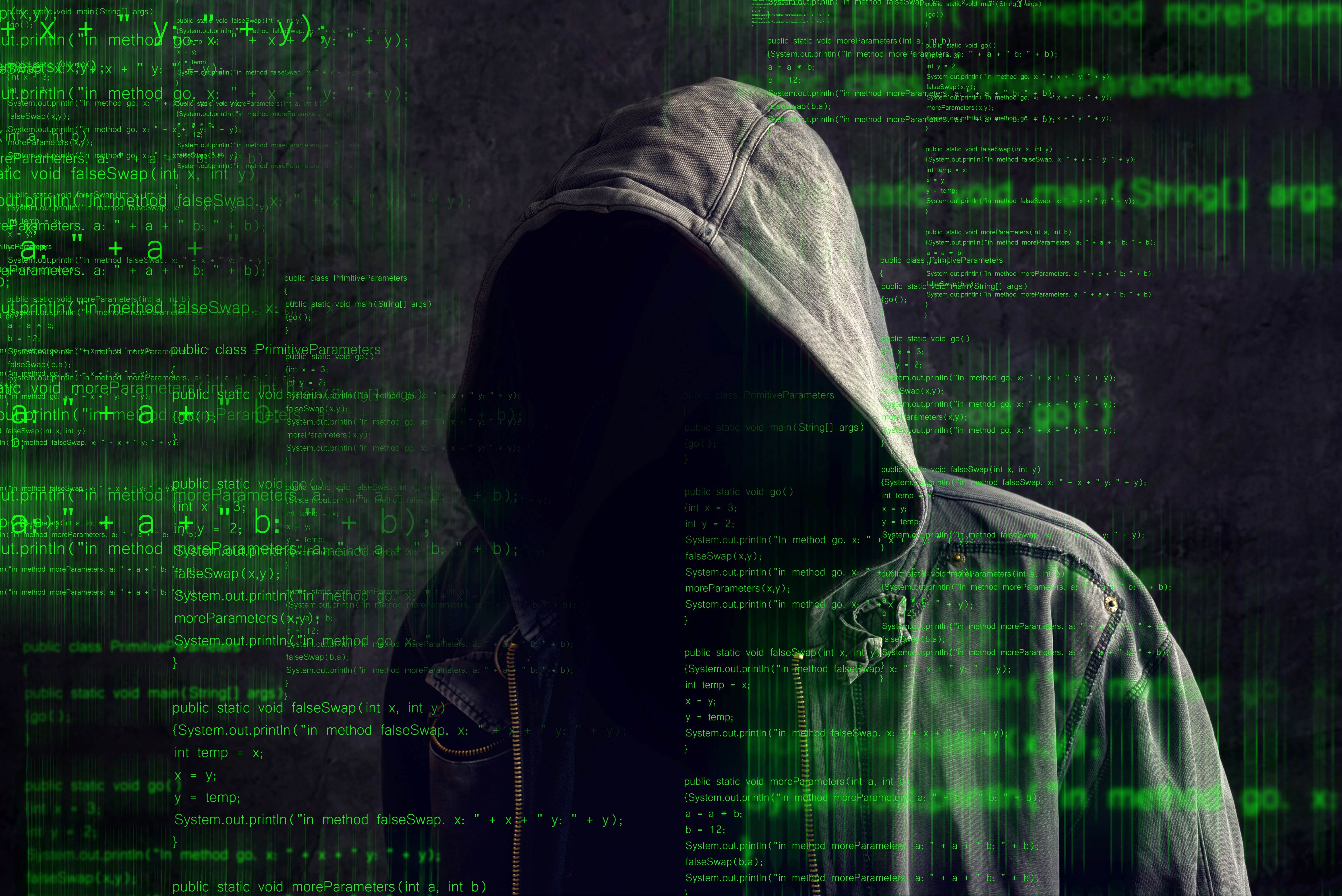 Faceless hooded anonymous computer hacker (1)